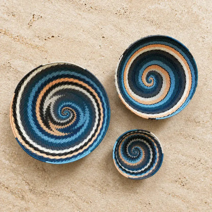 Handwoven african zulu bowls in navy teal cream and black made from recycled telephone wire city lights design