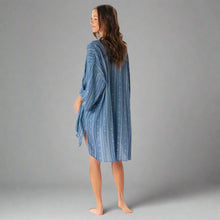 Woman in blue and white striped handmade beach cover, Aloha Tribal Cover Up style