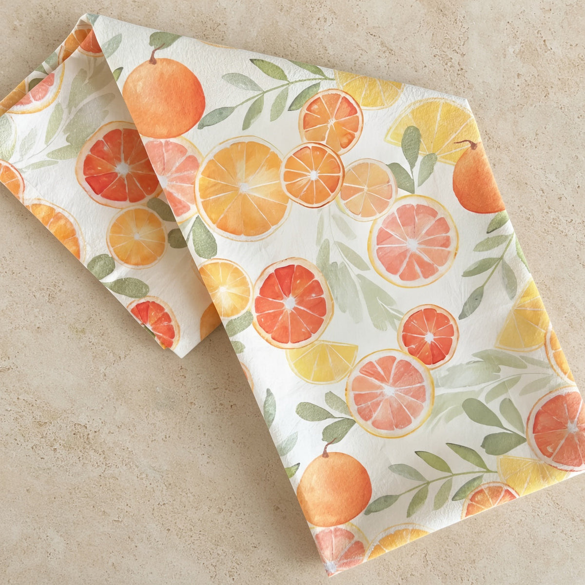 White artisan tea towel with watercolor citrus fruit design on pre-washed flour sack fabric