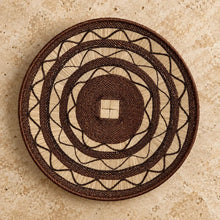 Authentic binga circular wall hanging with concentric geometric patterns in natural and dark brown woven fibers