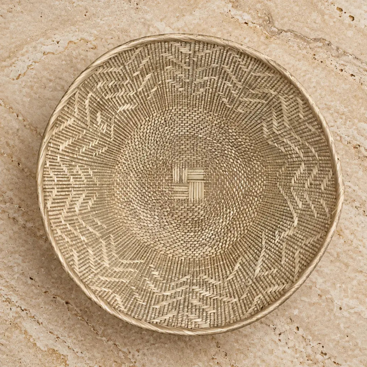 Authentic binga basket wall decor in beige handwoven with intricate geometric patterns and central woven square