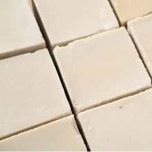 White ceramic tile floor with grout lines for Authentic Turkish Black Clay Soap