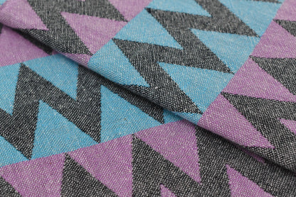 Organic bath towel with bold purple teal and black zigzag pattern perfect for beach and bath use