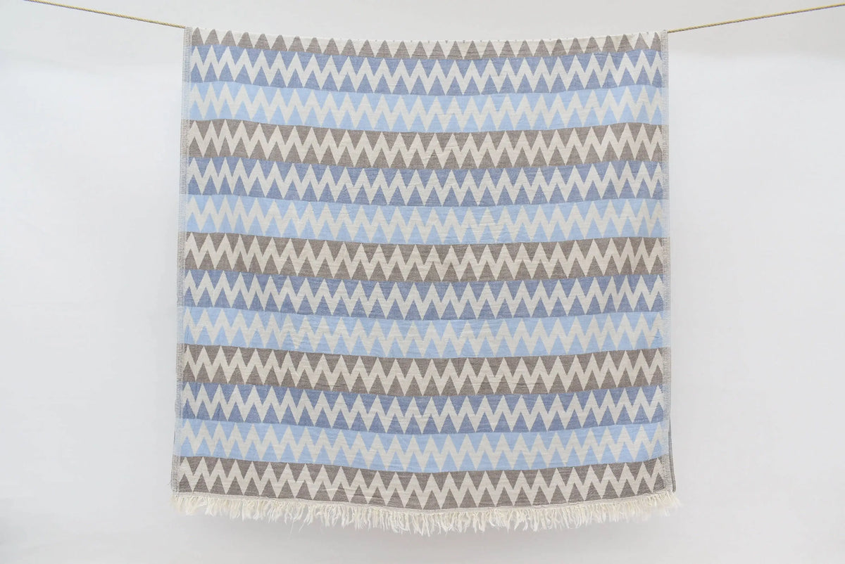 Organic turkish towel beach towel with light blue gray and white stripes and fringed edges 36x78 rectangular woven throw