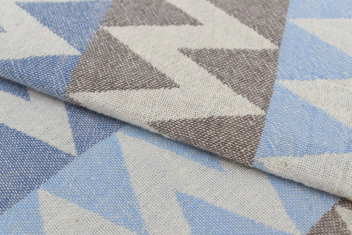 Textured organic turkish towel beach towel in soft blue gray and off white with geometric triangle pattern 36x78