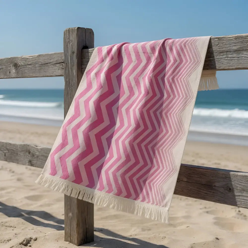 Authentic turkish organic cotton beach towel in pink and cream zigzag pattern with fringed edges