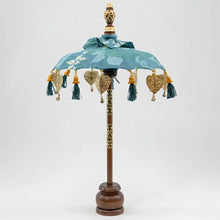 Balinese tabletop umbrella blue and green floral with teal fabric, gold embossed hearts, and tassels for grace temple ceremonies ornamental parasols