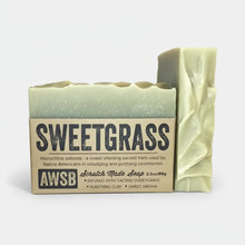 Sweetgrass bar soap with green white speckles from natural ingredients