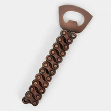 Brown bike chain bottle opener with curved metallic handle