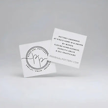 White square business cards with black minimalist typography and circular logo for prodigal pottery bird ornament perfect for bird lovers and precious bird ornaments enthusiasts