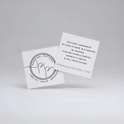 White square business cards with black minimalist typography and circular logo for prodigal pottery bird ornament perfect for bird lovers and precious bird ornaments enthusiasts