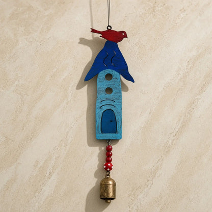 Blue wooden birdhouse ornament with red bird, dangling beads, and brass bell bird bell wind made from recycled metals