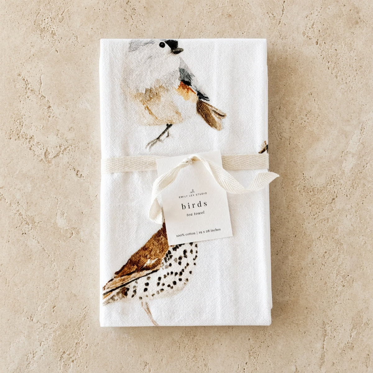 White cotton flour sack tea towel with watercolor birds featuring gray brown and black speckled plumage