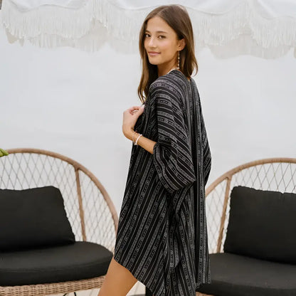 Black tribal print kimono cover-up with black and white striped geometric patterns perfect for layering