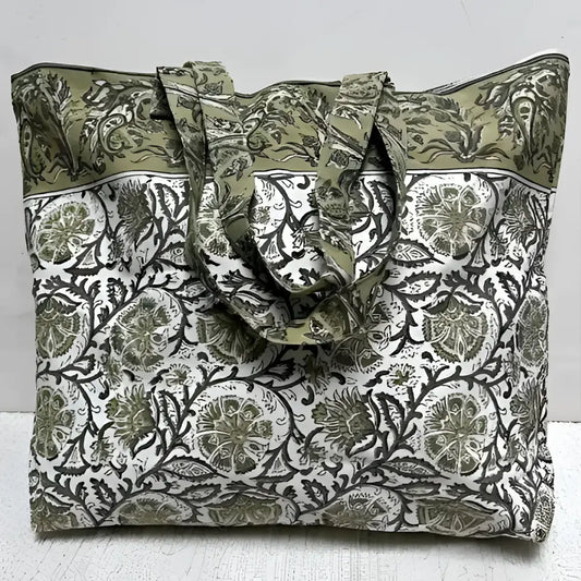 Large canvas tote bag with hand block printed design in muted greens and natural tones.