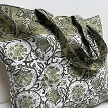 Large canvas tote bag with hand block printed design in muted greens and natural tones.