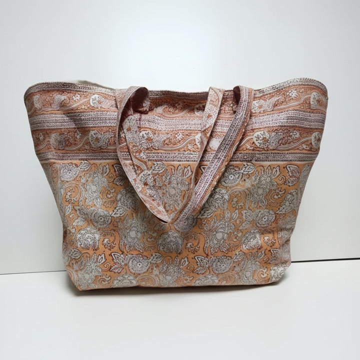 Hand block printing cotton canvas tote with rashmi orange pattern and floral stripe design