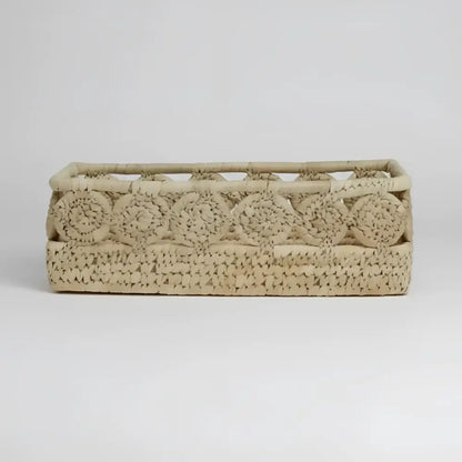 Blossom Nest palm medallion basket with intricate beige rattan weave
