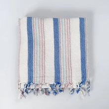 Blue and ivory striped hand woven Turkish hand towel with thin red stripes.