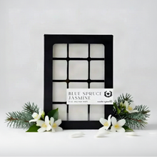 Black-framed box of twelve white soy wax melts labeled blue spruce jasmine by nectar republic with phthalate-free fragrance and essential oils