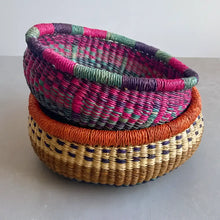 stack of three colorful baskets