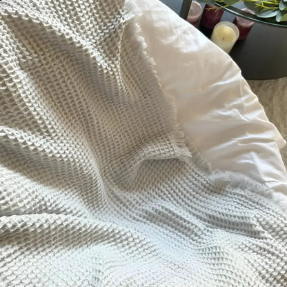 Soft handmade off-white waffle-knit throw from Bookworm Nest set