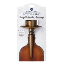Handmade brass-colored bottelabra tealight candle accessory with flared base and tapered stem for bottle openings