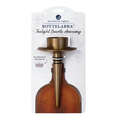 Handmade brass-colored bottelabra tealight candle accessory with flared base and tapered stem for bottle openings