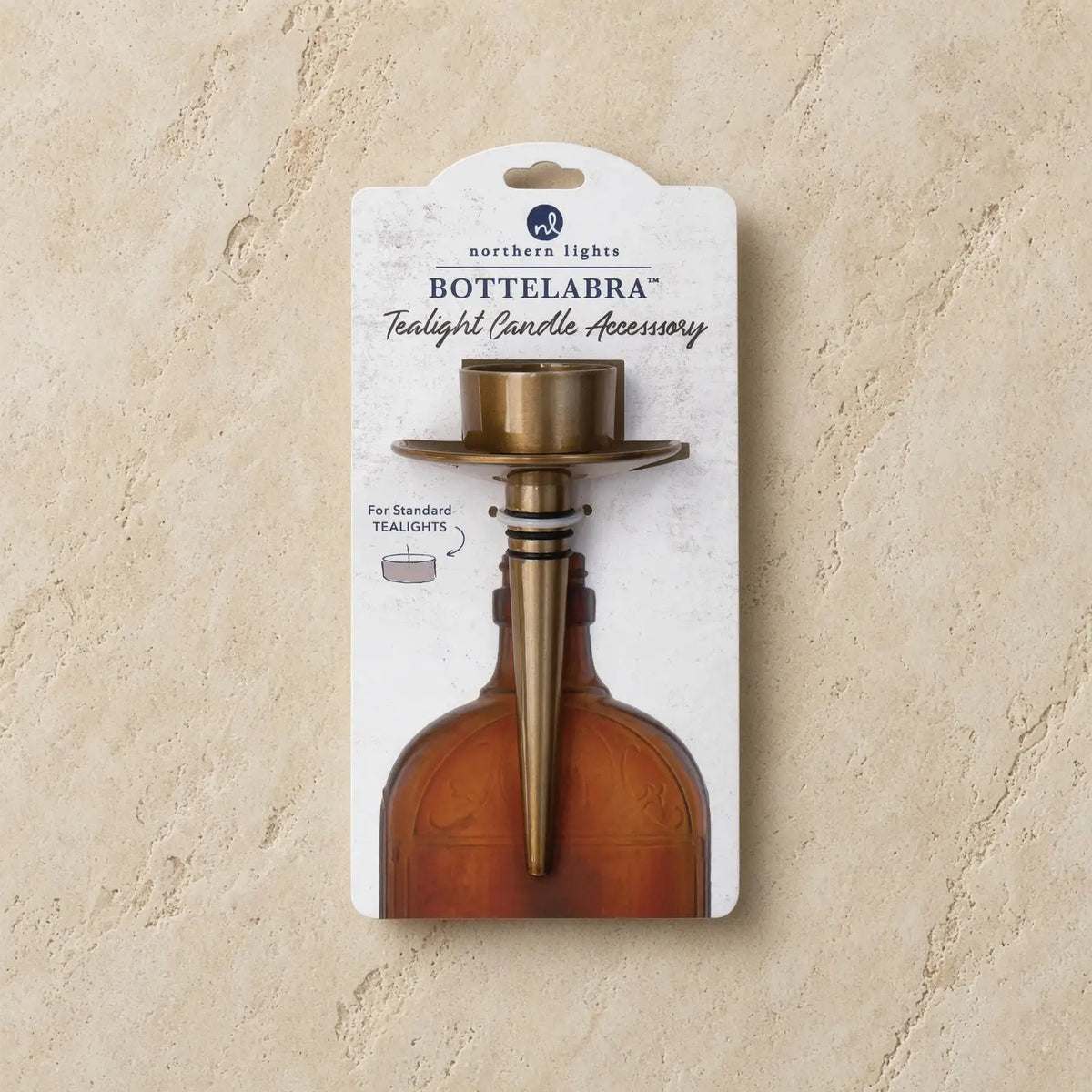 Brass-colored bottelabra™ tealight holder with flared top and tapered stem to transform empty bottles elegantly