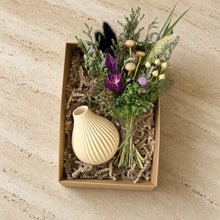 Cream-colored ribbed ceramic vase with dried floral bouquet in box from boyds custom fabrication 3d printed gift set