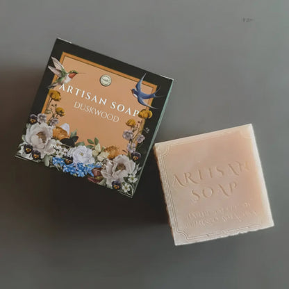Pale peach artisan block soap with embossed lettering, beautifully boxed in Duskwood floral design