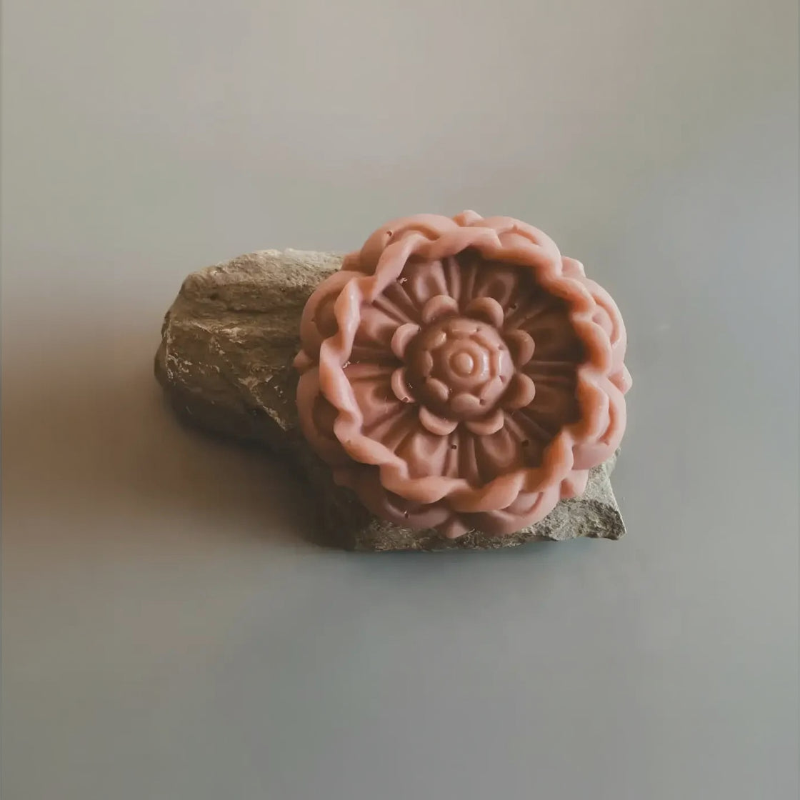 Pink handmade soap Flora N° 6 with olive oil petals on stone for daily wash