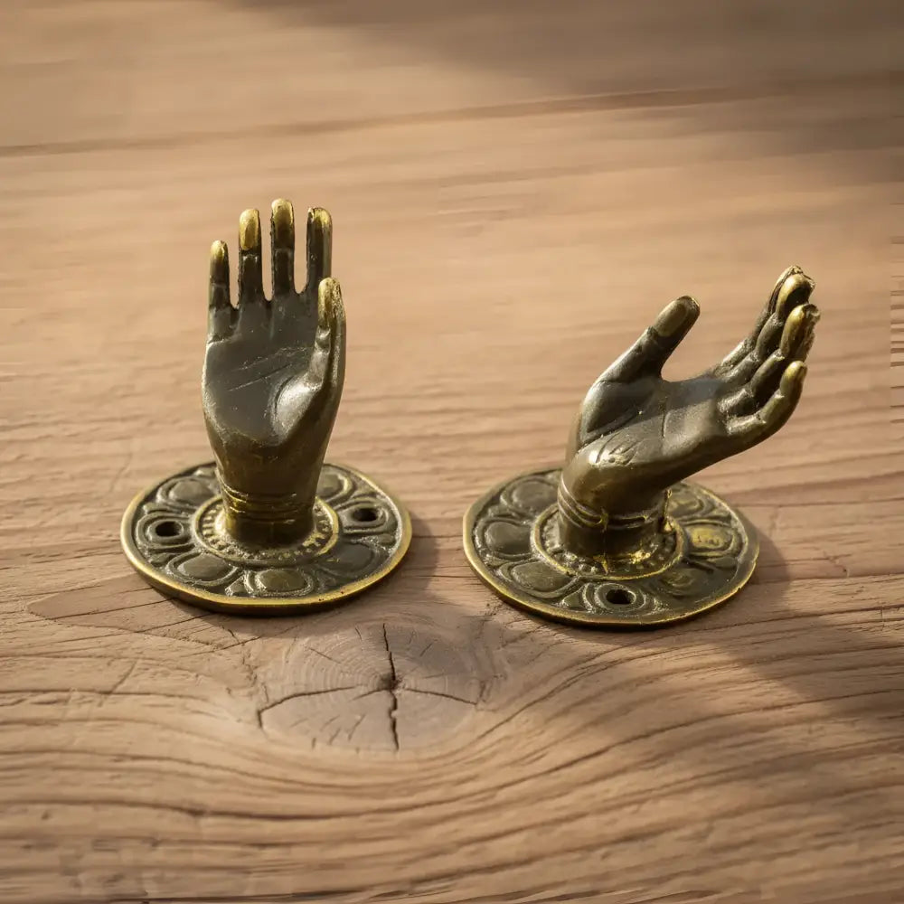 Brass mini mudra hand jewelry holder set with brass hand hooks and intricate circular base designs for boho decor