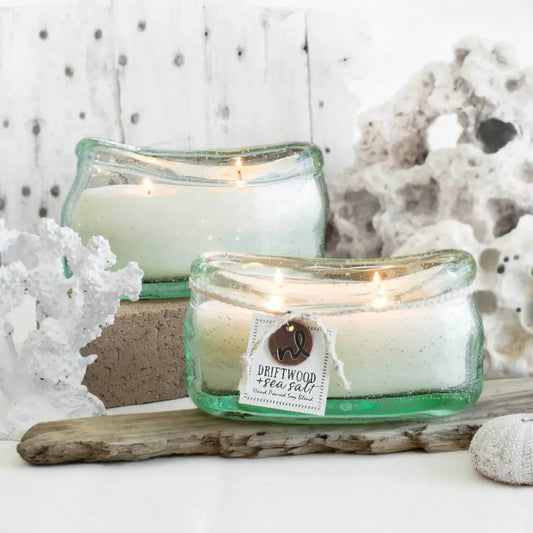 Lit candles in bubble glass jars from the Bubble Glass Candle Collection