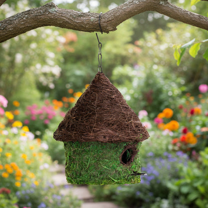 Charming bungalow woven birdhouse in fresh green with twig roof and mossy walls