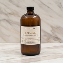 Handmade Baudelaire Calm Ocean Breeze bath soak bottle with dried lavender and organic seaweed