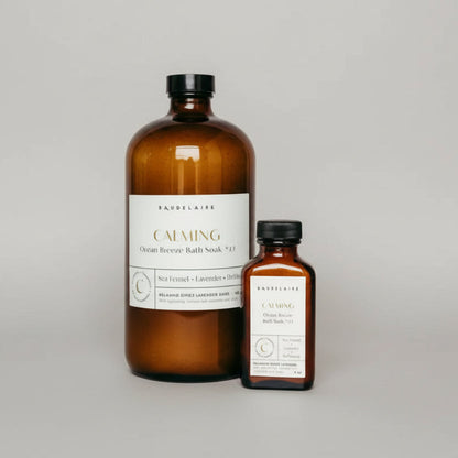 Baudelaire calming ocean breeze bath soak in amber glass bottles with dried lavender and organic seaweed