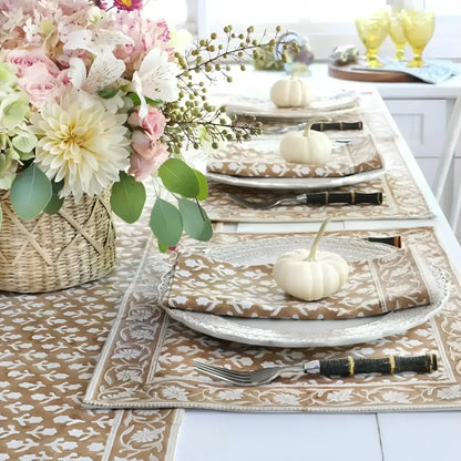 Beautifully set dining table with floral arrangements and autumn-themed Caramel Block Print Cotton Napkins