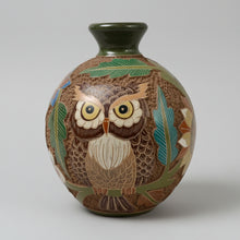 Colorful carved clay owl vase with intricate carvings and feather details