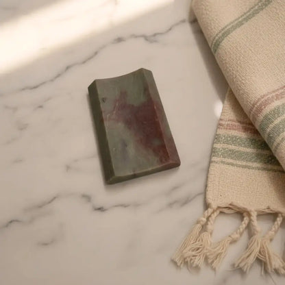 Carved soapstone rectangle concave soap dish with green and reddish brown handmade marble soap finish for bathroom use