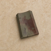 Carved soapstone rectangle concave soap dish with smooth polished jade stone featuring green and reddish brown veining