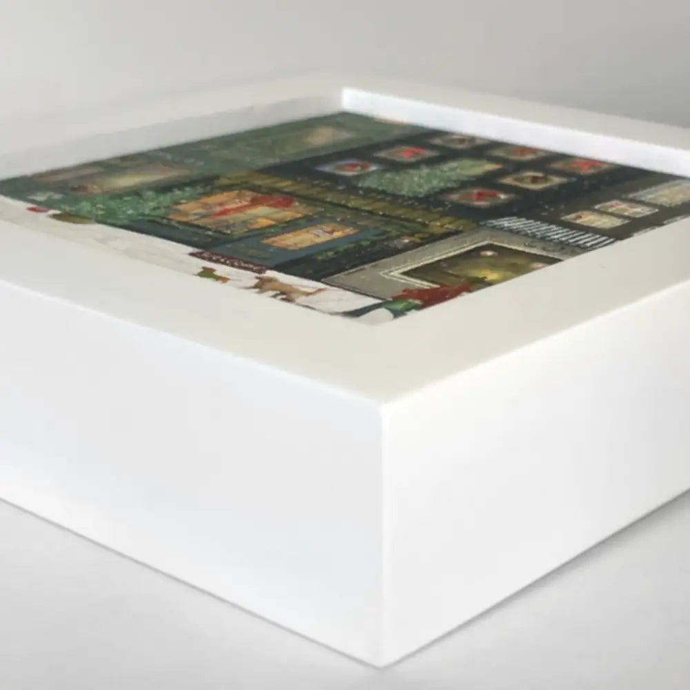 White framed Cathy Walters Happy Squares™ cat on books collage