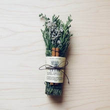 Four handmade cedar smudge sticks with sage, tied in twine from Tepanga Winds