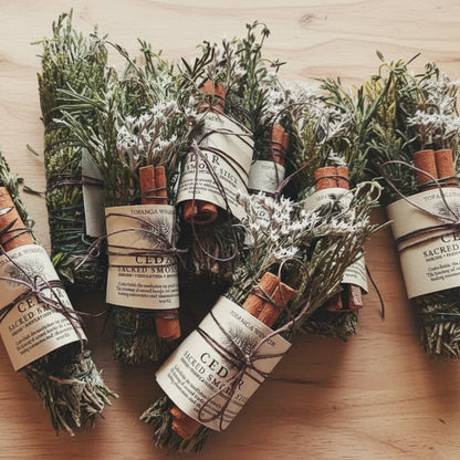 Handcrafted cedar smoke cleansing stick with rosemary, thyme, and cinnamon
