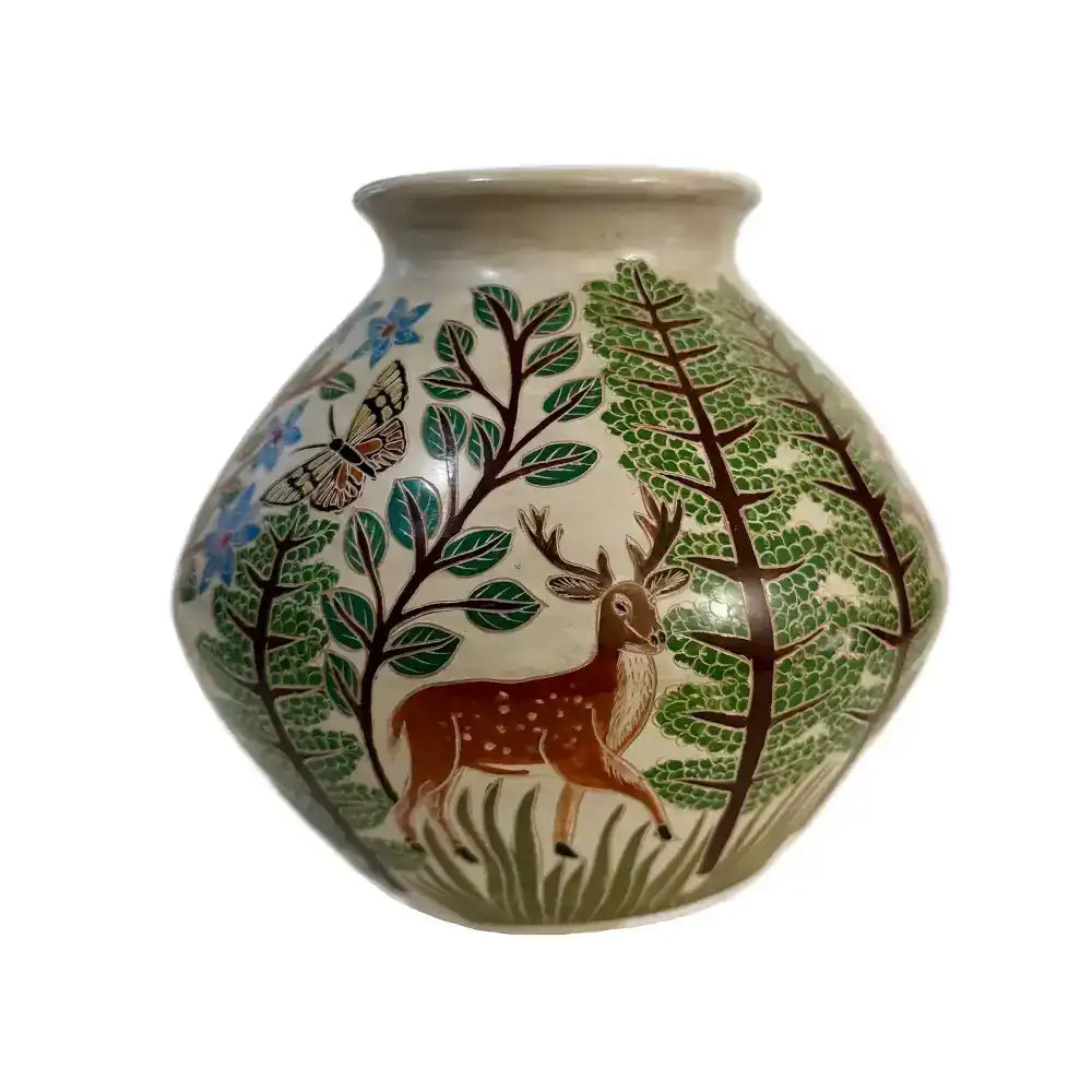 A carved ceramic vase featuring a woodlands habitat against a white background.