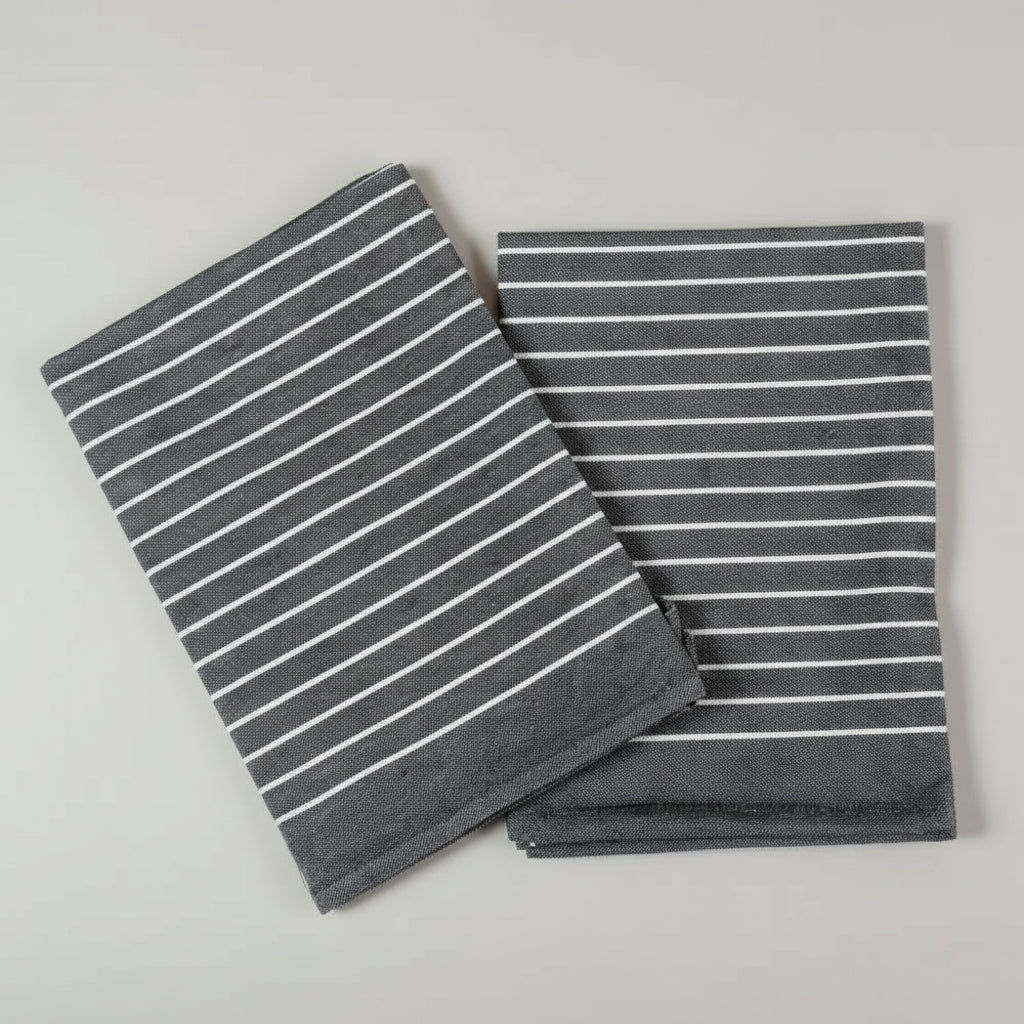 Charcoal gray organic cotton tea towel set with white stripes and wearable apron