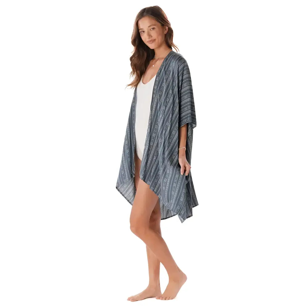 A flowing charcoal tribal print kimono cover-up with dark blue and white stripes and a loose fit