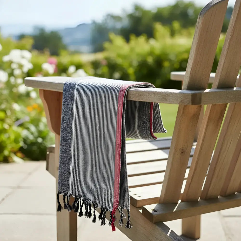 Charcoal white and ruby striped turkish cotton towel with gray white stripes red border and black tassels