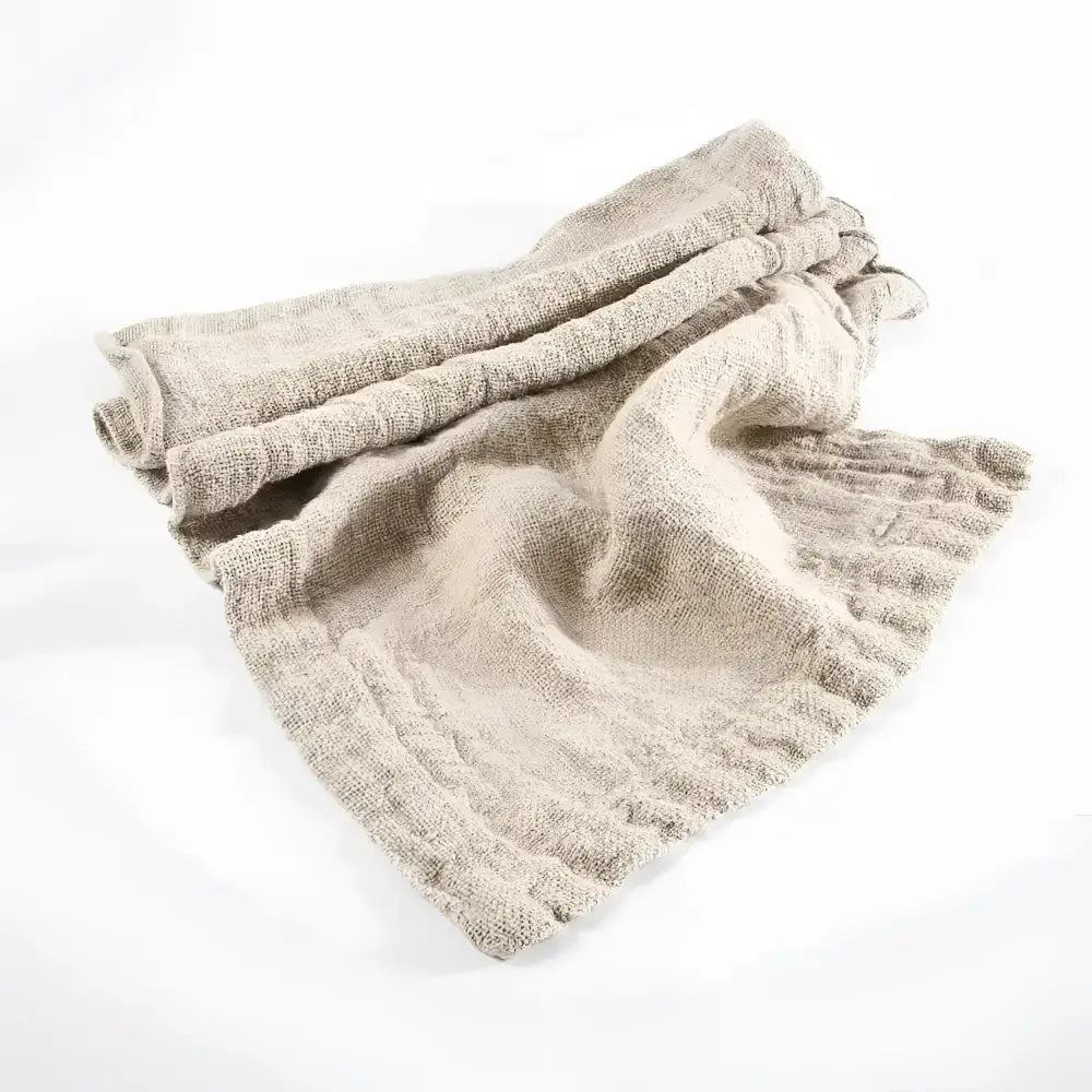 textured linen table runner with neutral background.