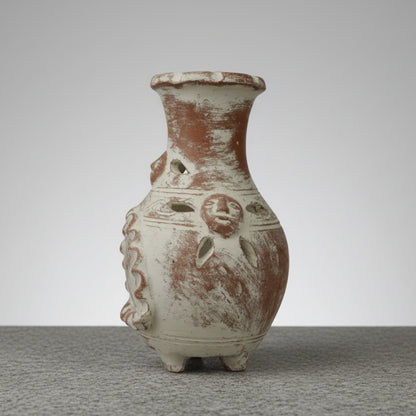 Hand-painted terracotta face vase in white glaze, rustic garden style